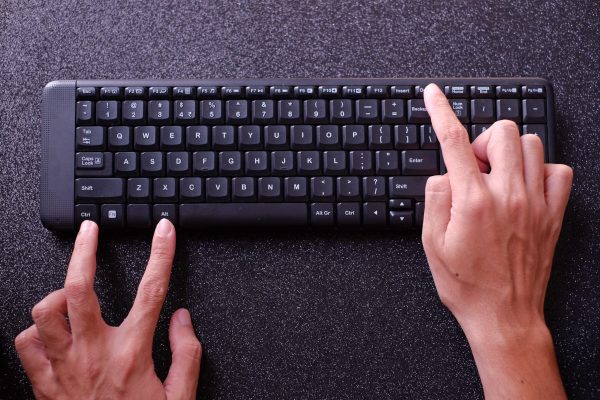 Hands,Pressing,Ctrl,Alt,Del,On,Computer,Keyboard,,With,Black