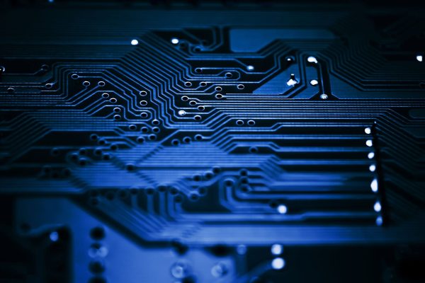 Close-up,Of,Blue,Circuit,Board,With,Traces,And,Components,For