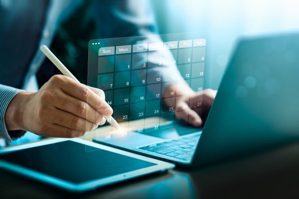 Business,Professional,Using,Digital,Tools,To,Manage,A,Futuristic,Calendar Business,Professional,Using,Digital,Tools,To,Manage,A,Futuristic,Calendar