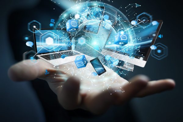 Tech,Devices,Connected,To,Each,Other,By,Businessman,On,Blurred Tech,Devices,Connected,To,Each,Other,By,Businessman,On,Blurred