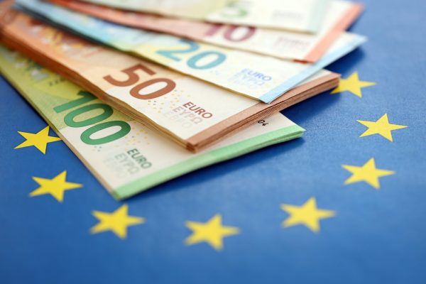 European,Eur,Currency,Money,Bills,On,Euro,Union,Blue,Flag